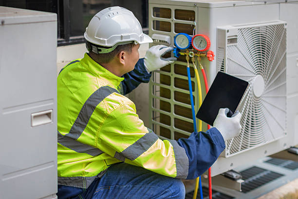 Professional Hvac technician working in Maylene, AL